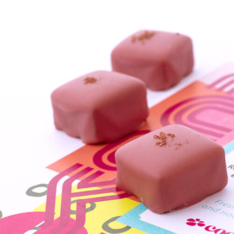 Three squares of pink chocolates from Cococo Chocolatiers 